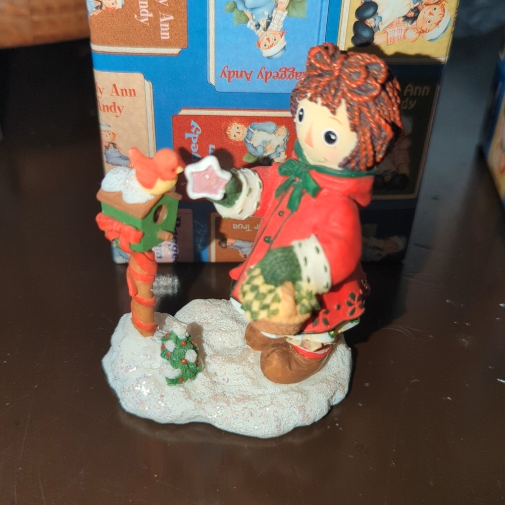 Festive Figurine with Red Coat and Green Mittens